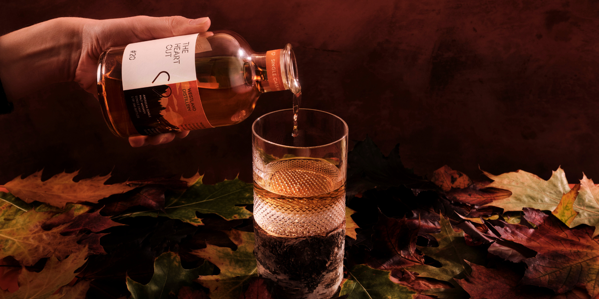 A bottle of The Heart Cut #20 Westland pouring into a glass 