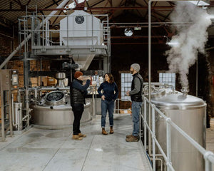 The White Peak distilery team in the distillery